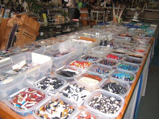 Kids table with beads, 25 cent to $2.00 rocks, flutes, marbles and more.