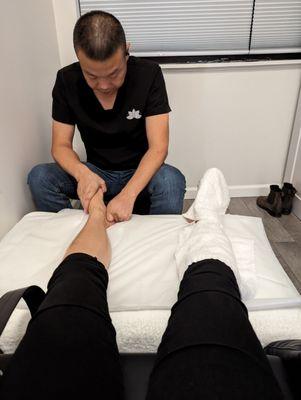 Foot massage on a very comfy chair