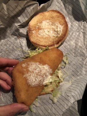 This is a fish sandwich with extra tarter sauce . I'll let the picture speak for itself .