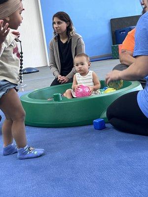 Teachers interacting with kiddos in independent time