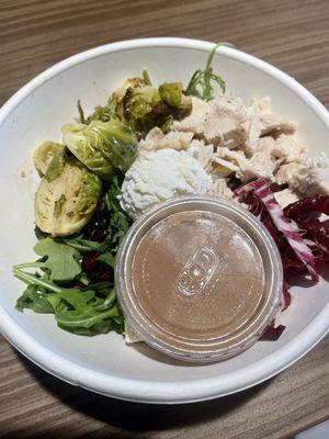 Wild Child Bowl - $12.25. wild rice, arugula, chicken, brussels, radicchio, goat cheese, craisins, & balsamic vinaigrette. Filling & tasty!