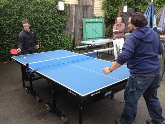 The ping pong table out back, with a couple of the regulars playing a game.