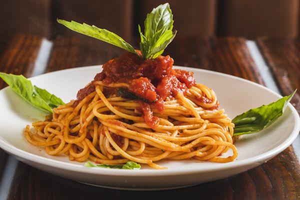 Spaghetti pomodoro. Add meatballs if you like.