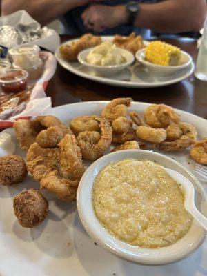 Fried catfish and fried shrimp, hush puppies and cheese grits