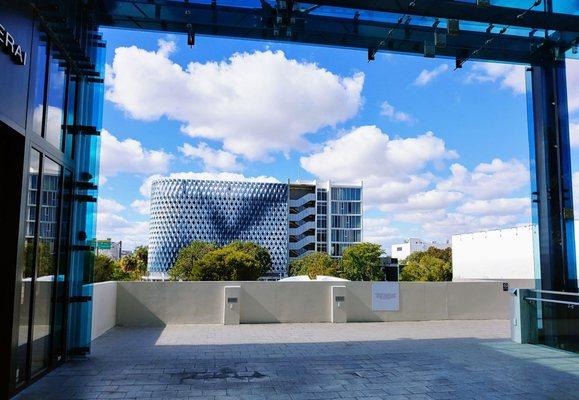 View of the City View Garage from the 2nd floor of the Palm Court. Le Corbusier sculpture is around the corner.