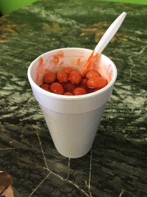 Japanese peanuts with chamoy, valentino hot sauce, fresh squeezed lemon.