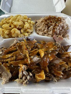 Jerk chicken with rice and beans and macaroni and cheese