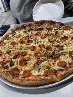 Large pepperoni, pineapple mushroom and beef pizza