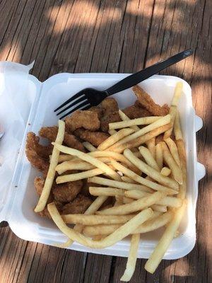 Fried shrimp with fries.