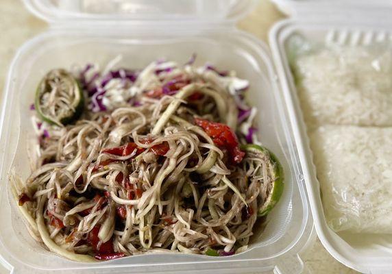 Lao style papaya salad (thum mak hoong). Those red things are mostly chili peppers. So goodwith sticky rice.