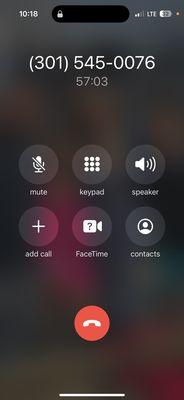 Image of my phone with time stamp showing how long I sat on hold waiting for someone to pick up.