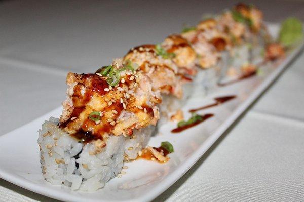 The Snow Crab Dynamite Roll was made with snow crab, spiced masago aioli, & osaki mix.