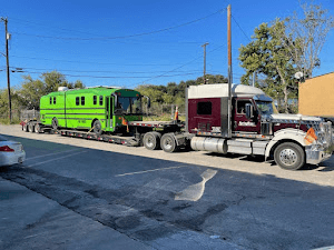 My "dream bus" being towed to Illinois because this company converted a bus in need of major repairs.