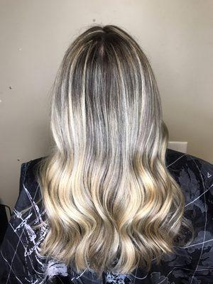 A custom color service of Balayage, highlights, a root melt, and lowlights.