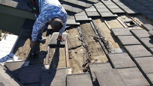 Tile roof leak repair.