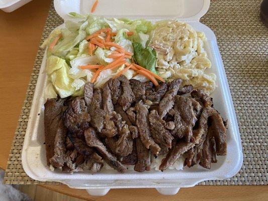 Teriyaki beef sauce on the side potato mac and green salad.