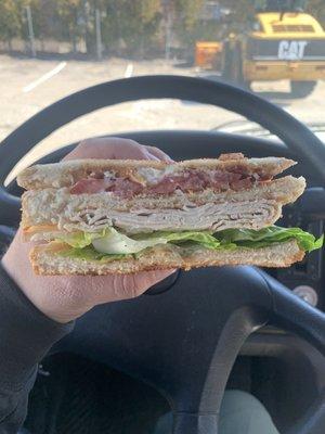 Turkey club with toasted bread hot off the griddle