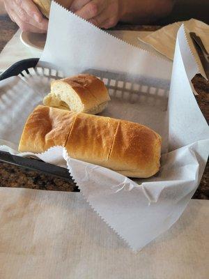 Sub roll with butter.