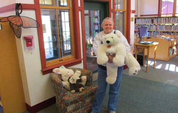 Scruffy person holding scruffy bear