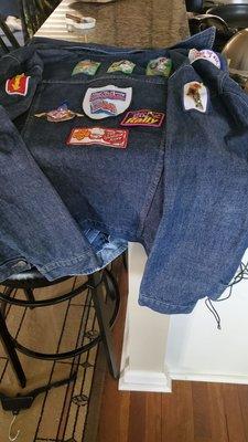 Denim jacket with patches all pinned and ready