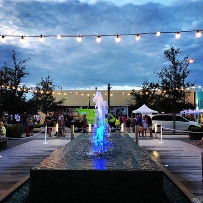 The fountain that does a colored water show.