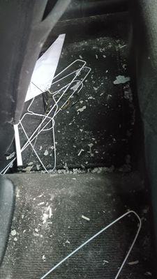 Debris left on the floor in the back seat of my car.