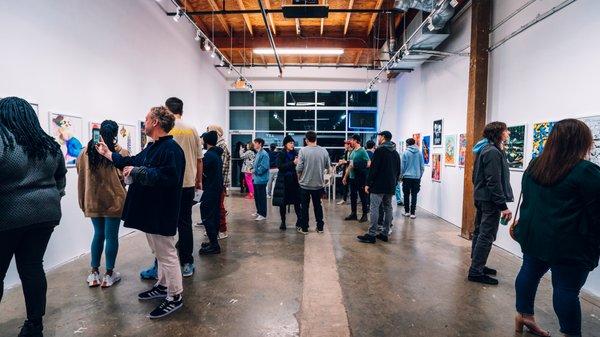 Opening reception of the 2022 'Off the Press' Group Show including a wide variety of art prints.