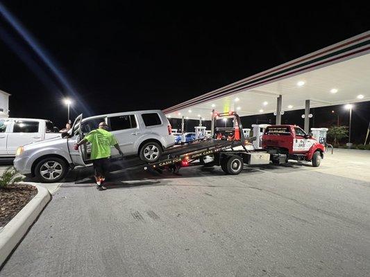 My poor car being towed  by the awesome Dwayne Johnson at Rock Solid!