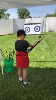 Shooting bow and arrows