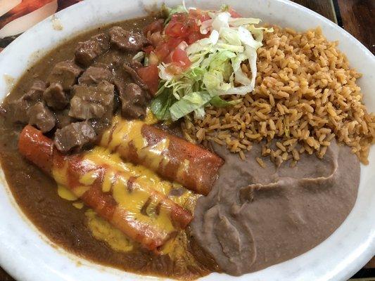 Texas Plate, includes Carne Guisada, 2 Cheese Enchiladas, rice & beans.