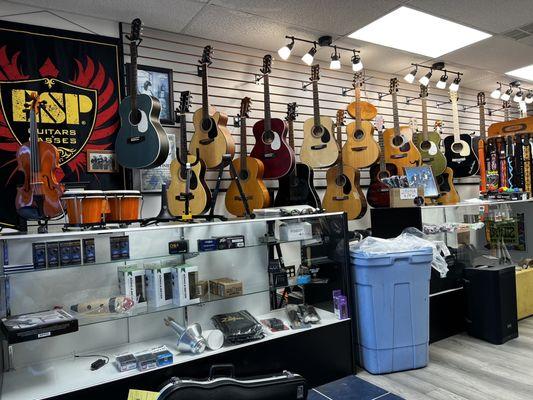 Large selection of guitars.