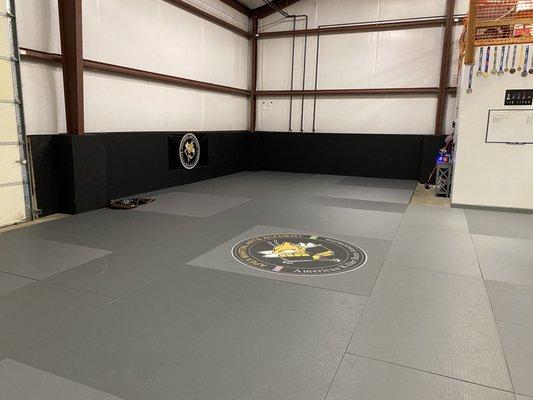 Jiu Jitsu mat space. They have a Muay Thai side which is spacious as well