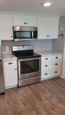 Kitchen remodel!  Cabinets, countertops, subway tile backsplash and appliences.