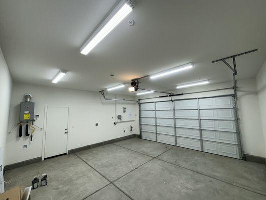 Removed old light in this garage and added new 4' strip lighting for this customer