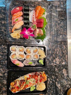 Sushi & Sashimi Combo (top) Spicy Salmon Roll (center) Volcano Roll (bottom)