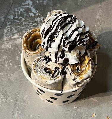 Cookies and cream with dulce de leche and whip and chocolate drizzle on top.