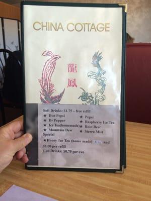 This photograph depicts the exterior front page of their menu