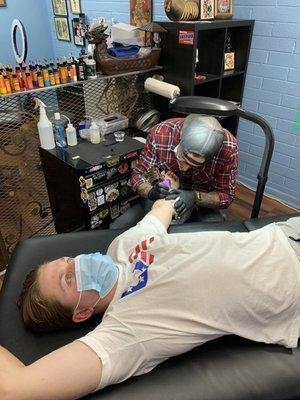 Getting his 1st Tattoo