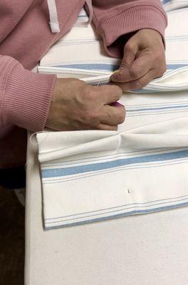 Our team creates hand sewn, pleated draperies to ensure a truly custom finish!