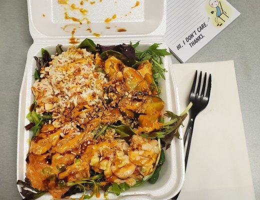 Poke Bowl - Volcano Salmon, Mango Shrimp, Spicy Cucumbers, and Honey Crab (looks like rice ) over Organic Spring Mix (sesame dressing)