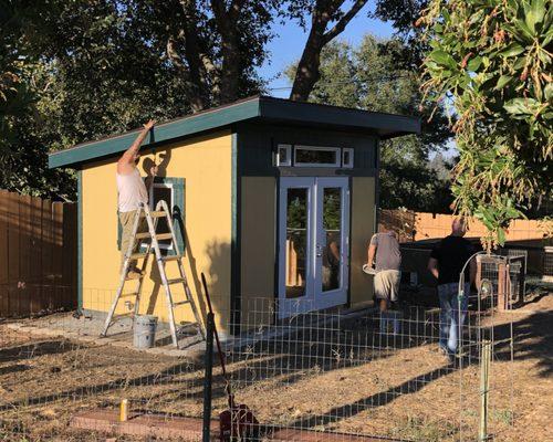 Putting final touches on the 2nd coat of paint. Looking really good! Amazing to see the 10'x12' shed installed and completed in one day!