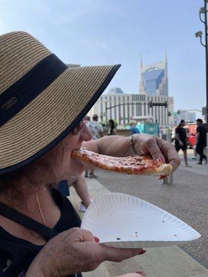 A real New Yorker eating a slice!!!