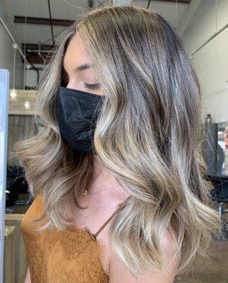 Multi-dimensional balayage, lived-in color, and haircut.