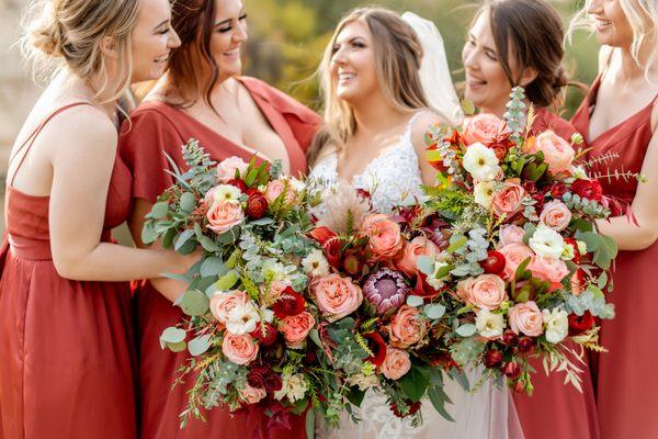 Beautiful Bridal and Bridesmaids Bouquets with Roses, Garden Roses, Protea, Eucalyptus, Cala lilies, and more