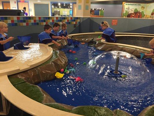 Children enjoy water play at the Exploratorium