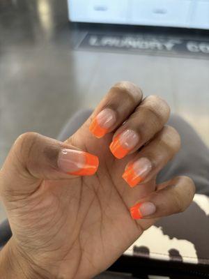 orange french tip gel manicure