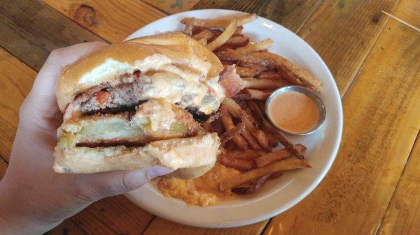 The "Mean Fried Green" Burger ... A thick patty topped with a Fried Green Tomato, 2 bacon strips, and drenched with fresh pimento cheese!