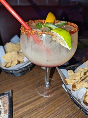 Pomegranate margarita with tajin trim