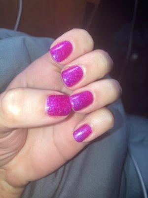 My glittery red-violet manicure on my left hand.