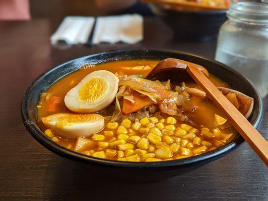 Seafood ramen with added egg and corn